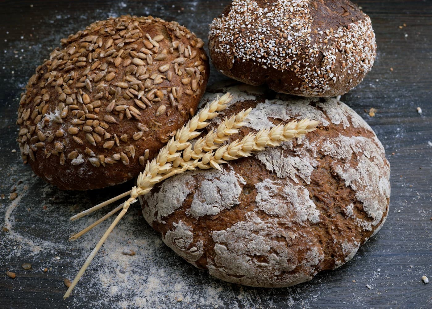 Fresh artisan loaves cooling in a warm bakery