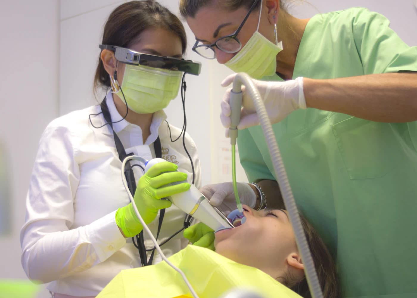 Two clinicians working together in a surgery
